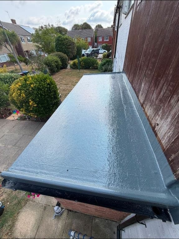 Finished grey GRP fibreglass flat roof after replacement - West Sussex